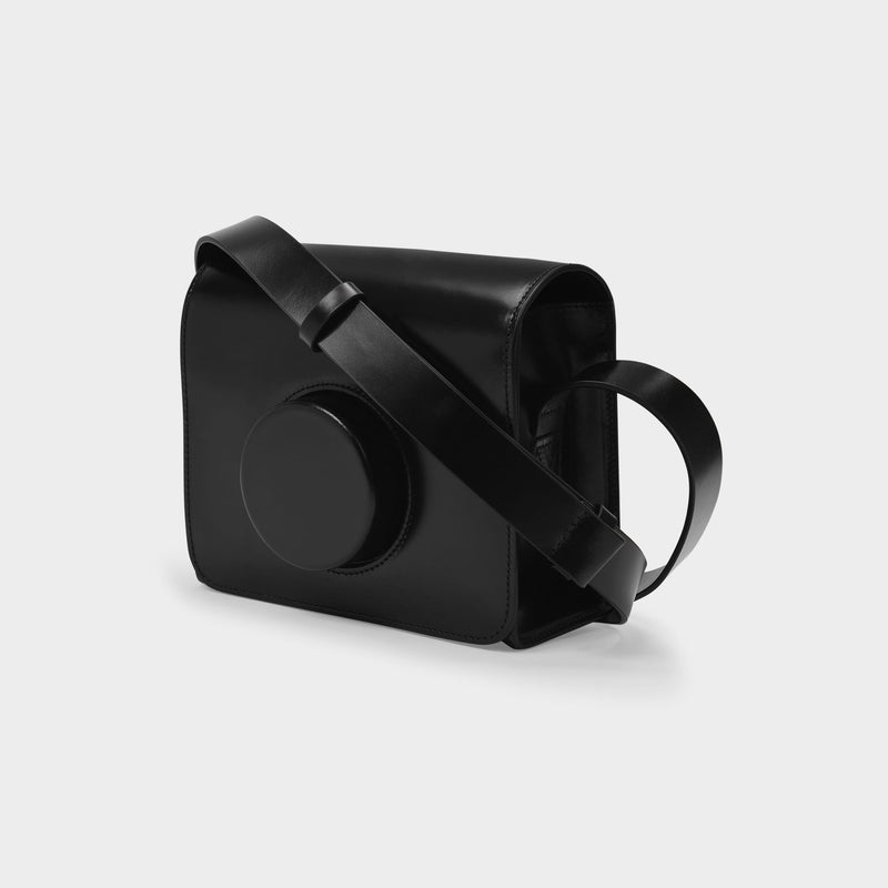 Kameratasche aus schwarzem Leder