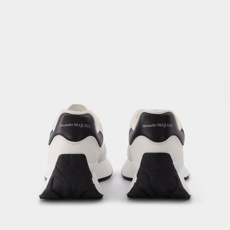 Sneakers aus Leder Weiß &amp; Schwarz