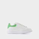 Sneakers Oversize aus weißem und grünem Leder