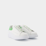 Sneakers Oversize aus weißem und grünem Leder