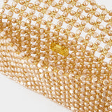 Clutch Sable Nacré mit Perlen in Gold