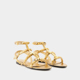 Rockstud No Limit Sandals in Gold Leather