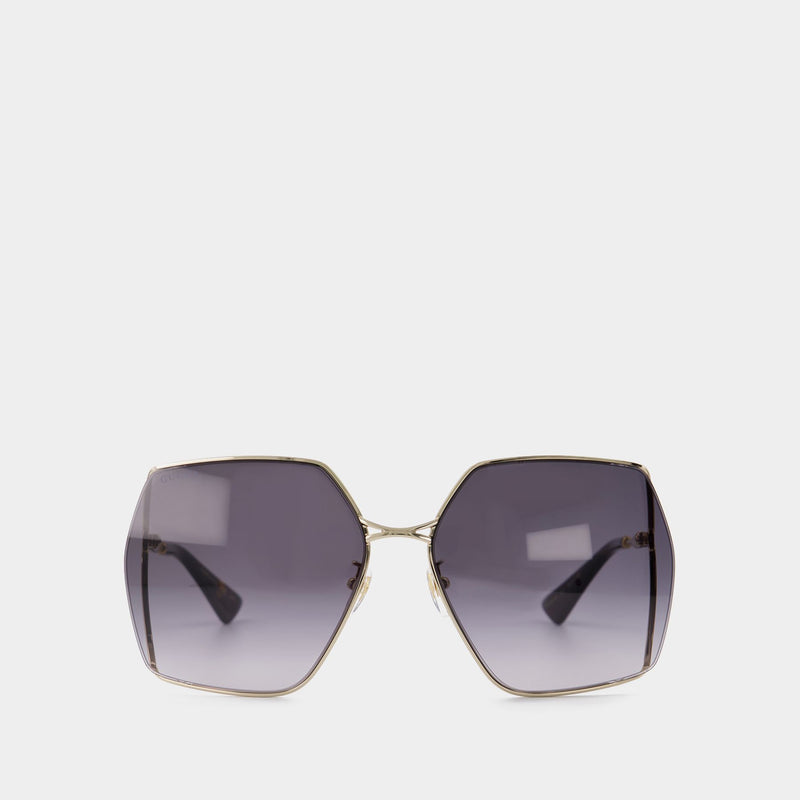 Sonnenbrille aus Métal goldfarbend/grau