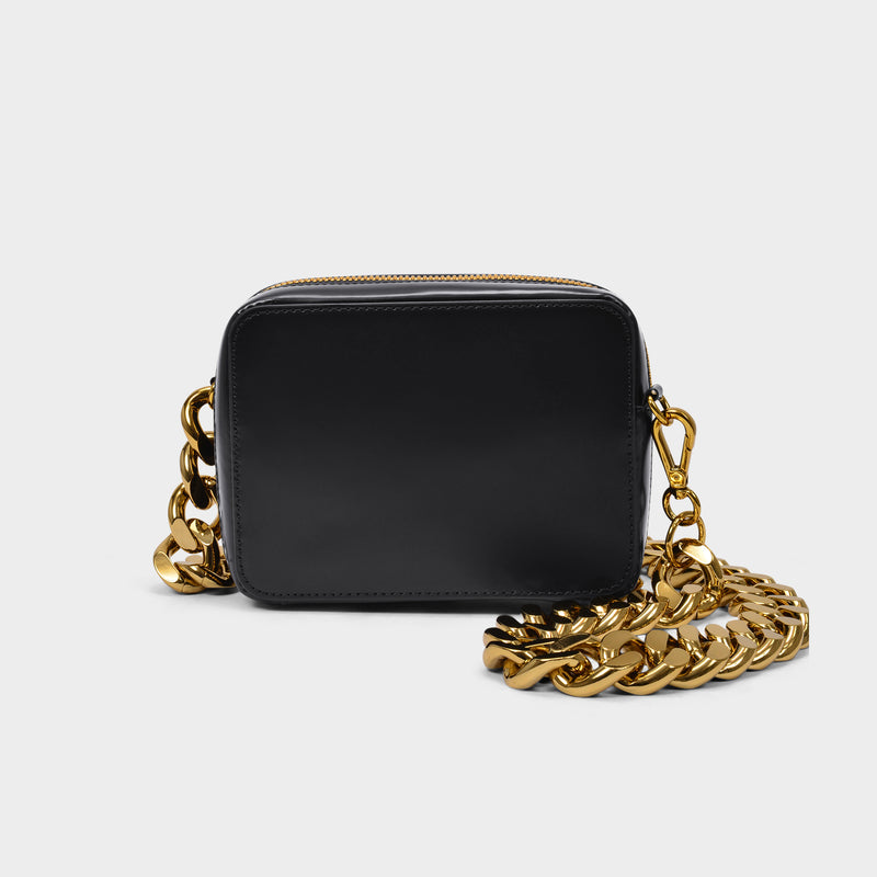 Tasche Chain Camera aus schwarzem Leder und goldfarbener Kette